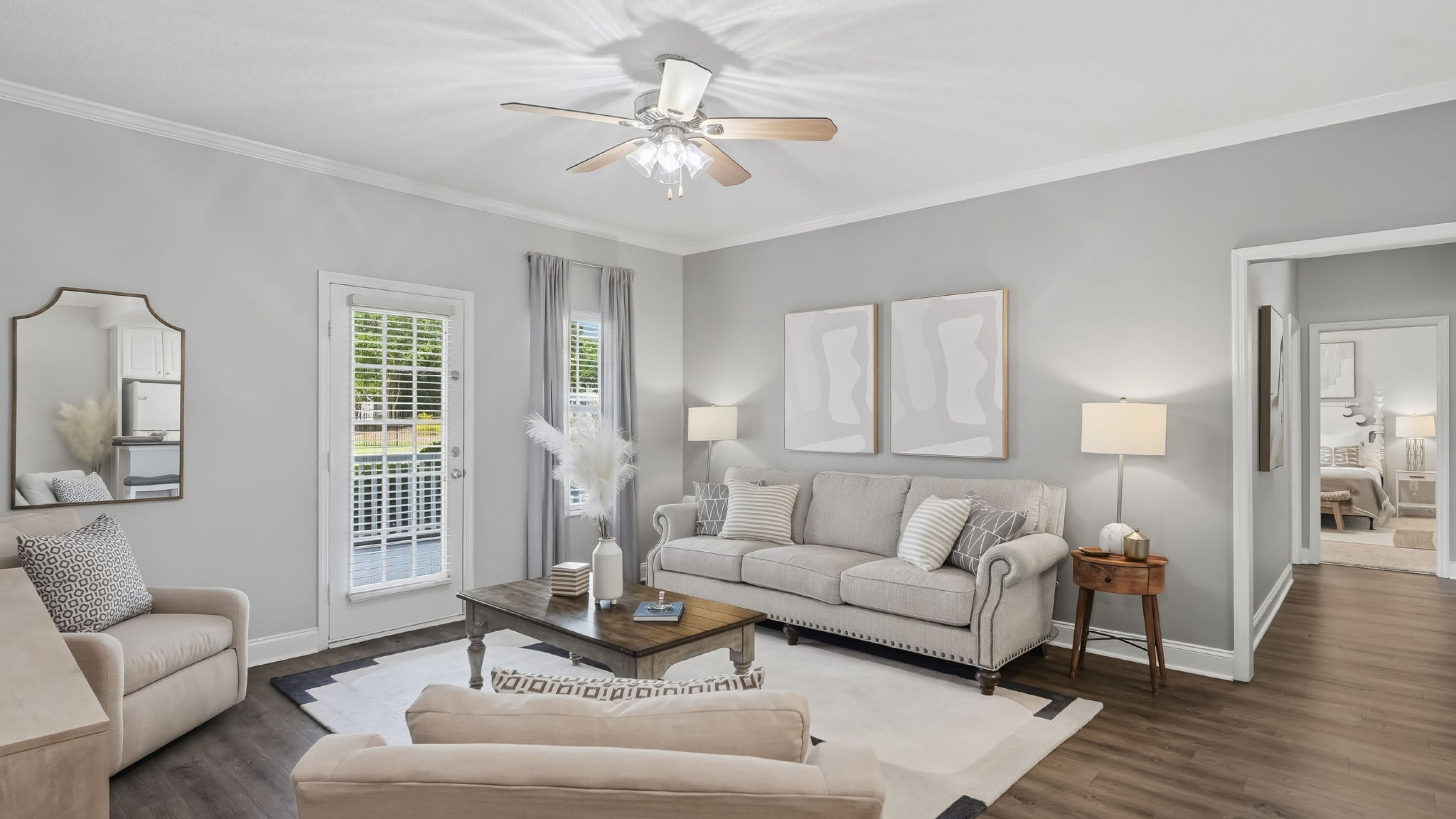 Cozy living room with plush seating and chic decor at Hawthorne Meadowview in Warner Robins, GA